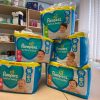 Pampers baby wipes stack on the table