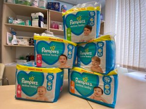 Pampers baby wipes stack on the table